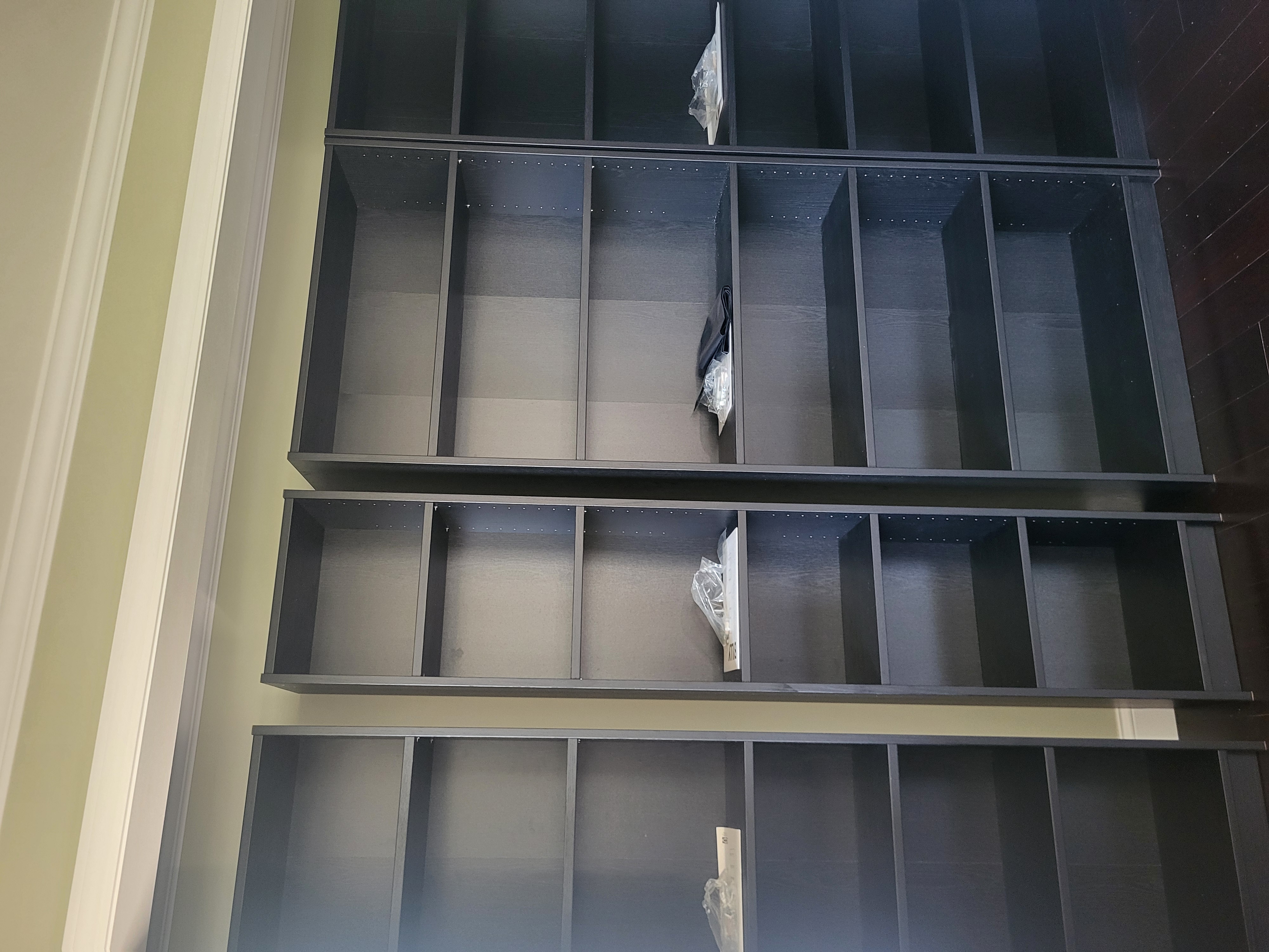 Installed dark built-in shelving